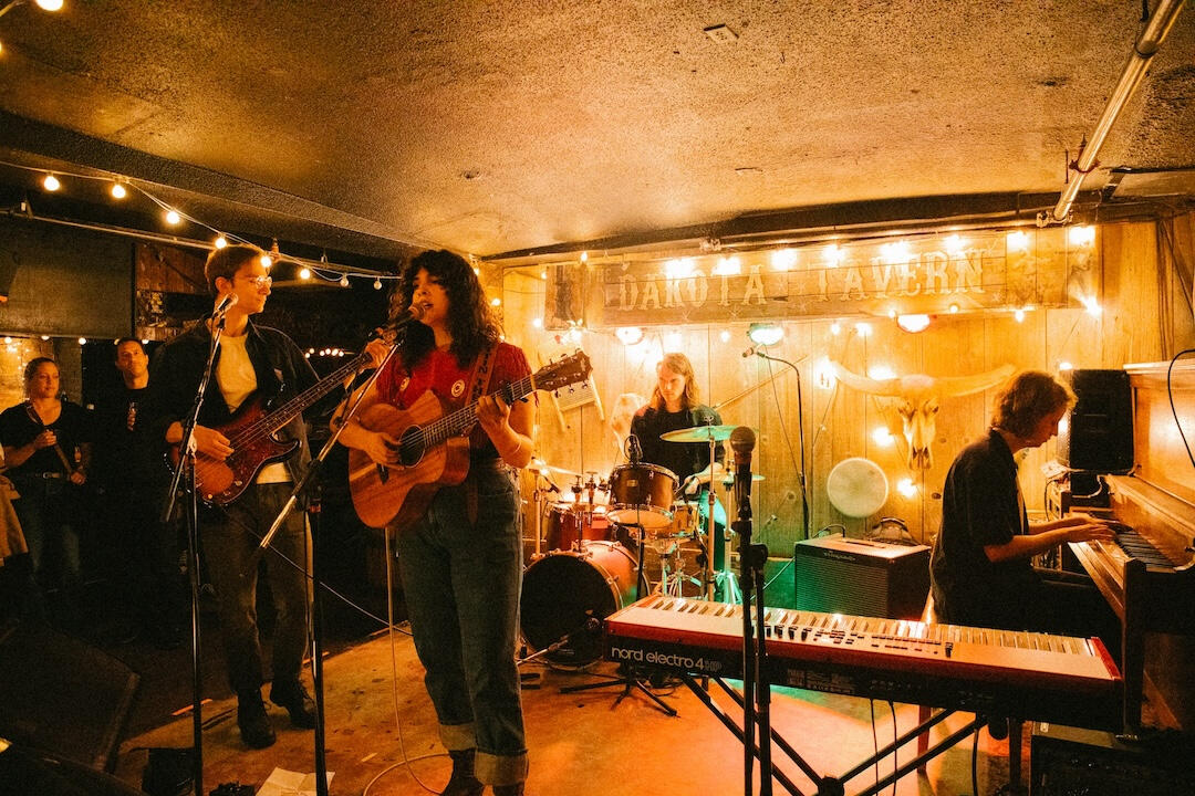 Photo by Vikram Singh Dante on stage with her band at the Dakota Tavern